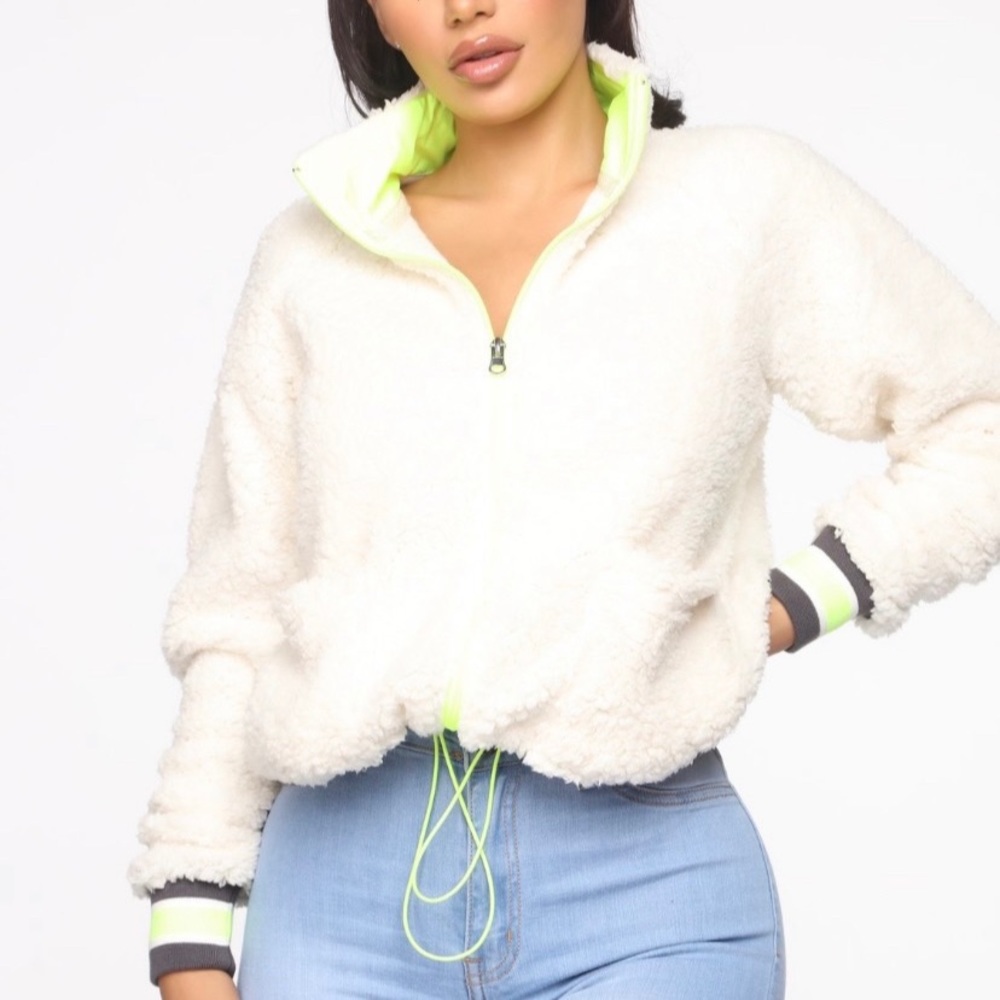 Fuzzy sweater still in bags untouched never worn!